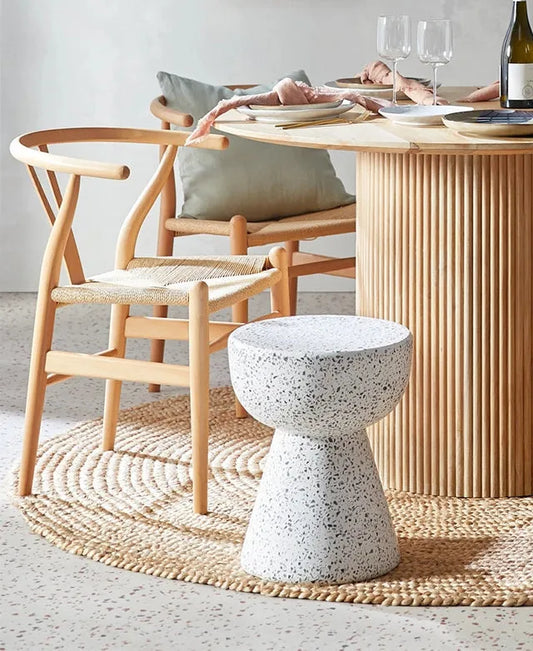 Kaza Jute Round Rug in a beach dining room